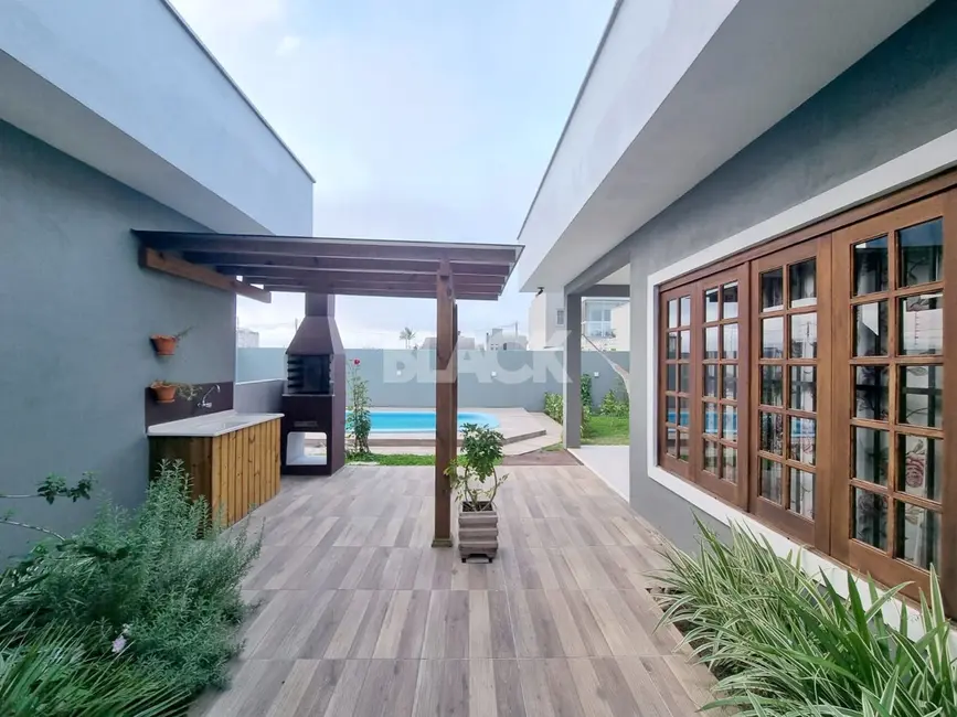 Casa com 3 quartos à venda, 179m2 em Torres - RS - imagem 5 Foto 5 de Casa com 3 quartos à venda, 179m2 em Torres - RS