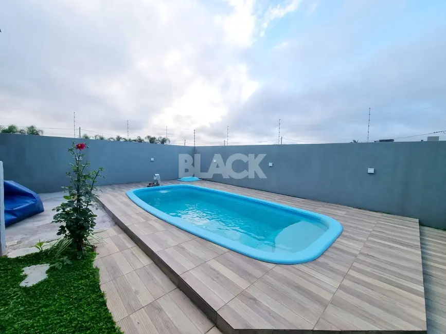 Casa com 3 quartos à venda, 179m2 em Torres - RS - imagem 7 Foto 7 de Casa com 3 quartos à venda, 179m2 em Torres - RS