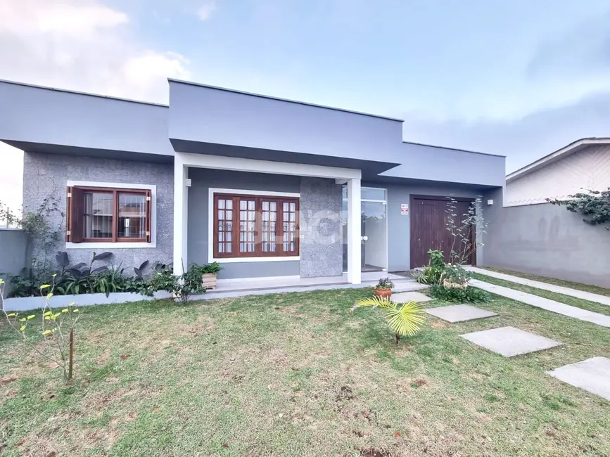 Casa com 3 quartos à venda, 179m2 em Torres - RS - imagem 1 Foto 1 de Casa com 3 quartos à venda, 179m2 em Torres - RS