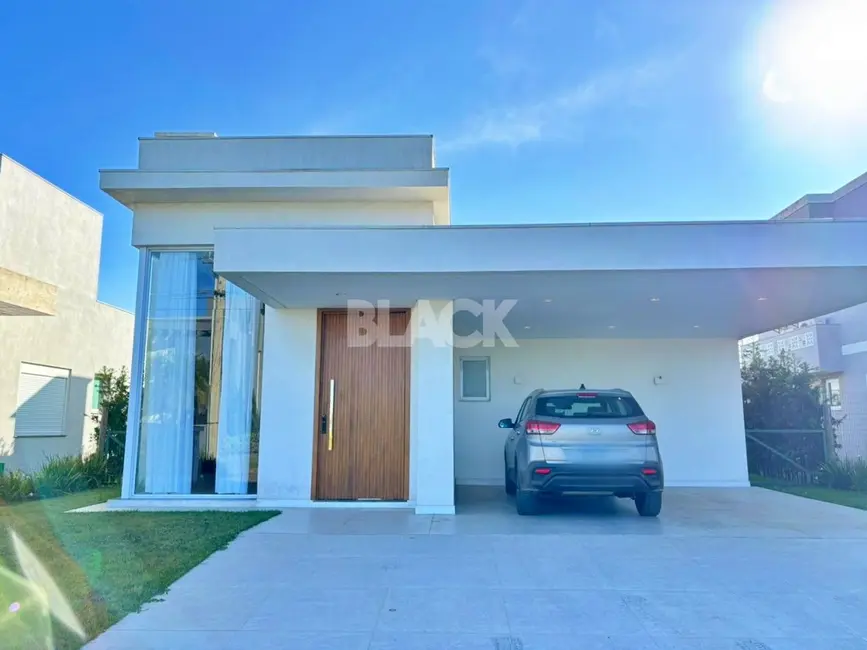 Foto 3 de Casa de Condomínio com 3 quartos à venda, 274m2 em Torres - RS