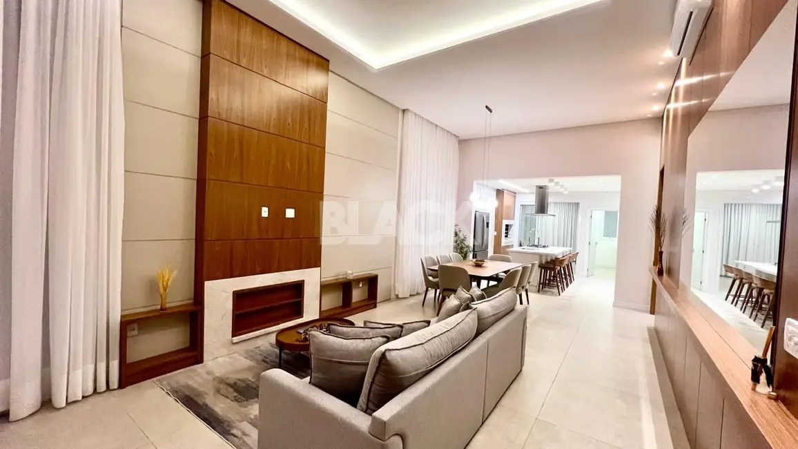 Casa de Condomínio com 3 quartos à venda, 274m2 em Torres - RS - imagem 4 Foto 4 de Casa de Condomínio com 3 quartos à venda, 274m2 em Torres - RS