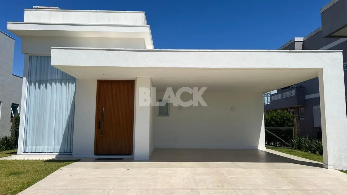Foto 1 de Casa de Condomínio com 3 quartos à venda, 274m2 em Torres - RS