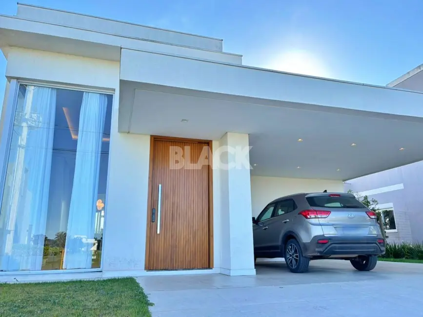 Foto 2 de Casa de Condomínio com 3 quartos à venda, 274m2 em Torres - RS