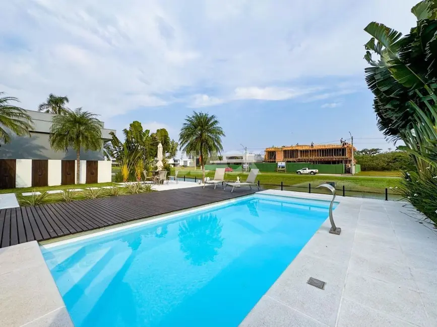 Casa de Condomínio com 3 quartos à venda, 374m2 em Torres - RS - imagem 4 Foto 4 de Casa de Condomínio com 3 quartos à venda, 374m2 em Torres - RS