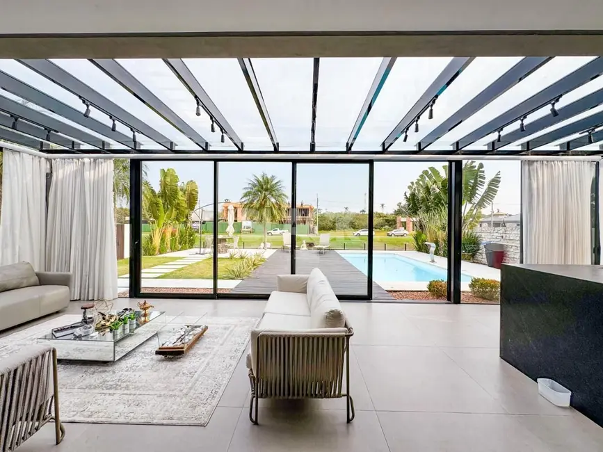 Casa de Condomínio com 3 quartos à venda, 374m2 em Torres - RS - imagem 7 Foto 7 de Casa de Condomínio com 3 quartos à venda, 374m2 em Torres - RS