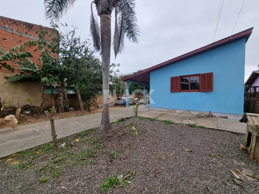 Foto 1 de Casa com 3 quartos à venda, 120m2 em Torres - RS