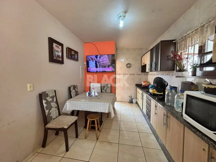 Foto 5 de Casa com 5 quartos à venda, 180m2 em Torres - RS