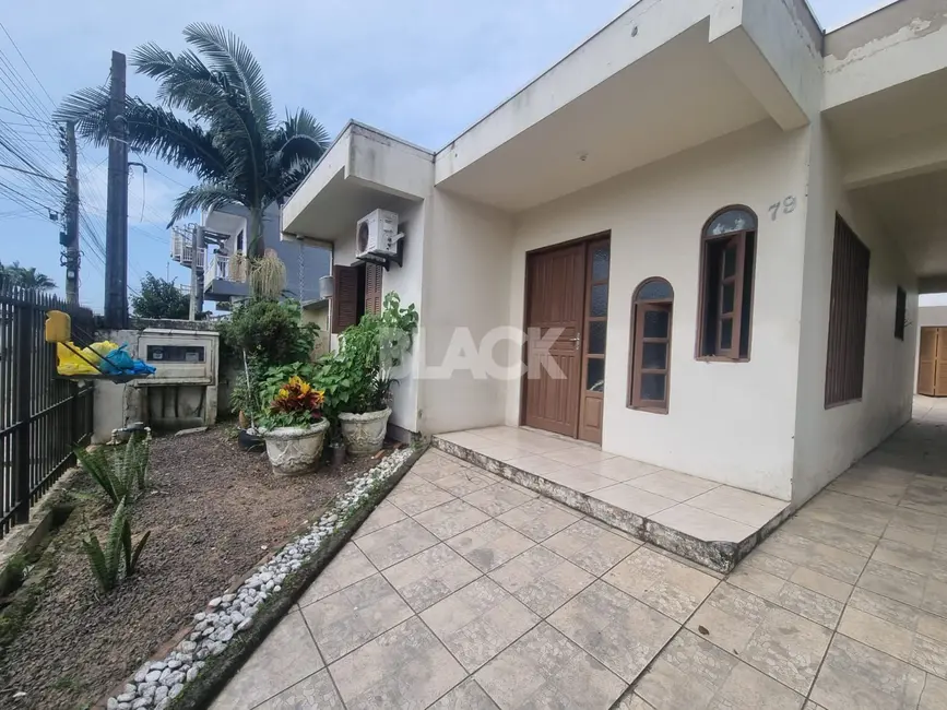Casa com 5 quartos à venda, 180m2 em Torres - RS - imagem 1 Foto 1 de Casa com 5 quartos à venda, 180m2 em Torres - RS