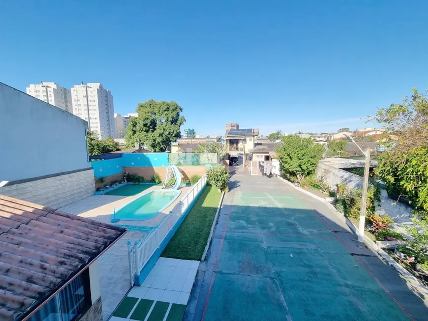 Casa com 3 quartos à venda, 384m2 em Torres - RS - imagem 5 Foto 5 de Casa com 3 quartos à venda, 384m2 em Torres - RS