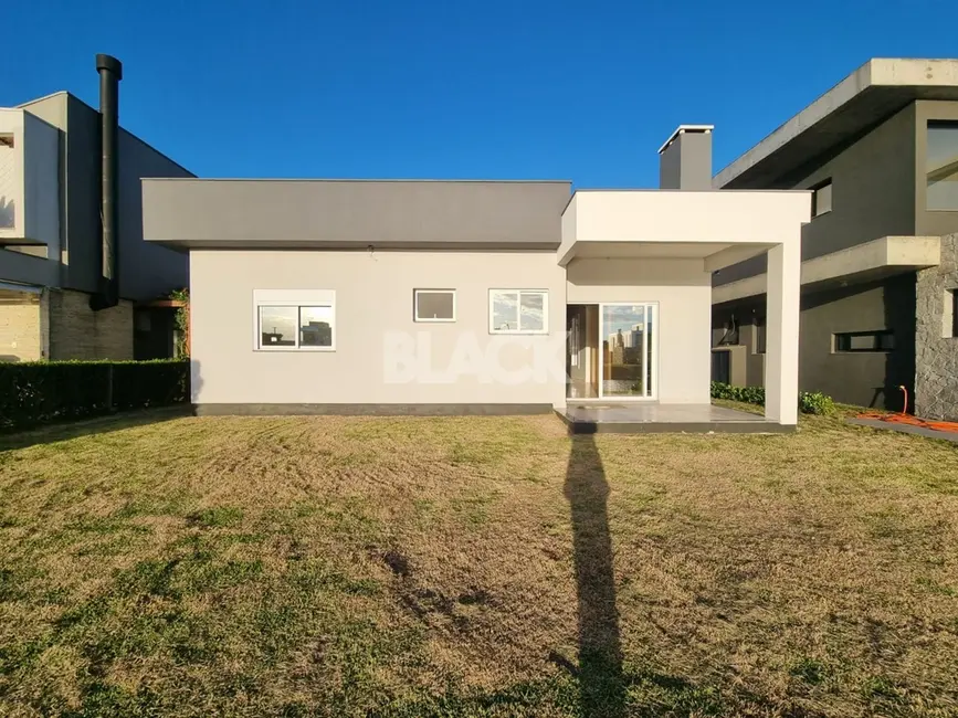 Foto 2 de Casa de Condomínio com 4 quartos à venda, 177m2 em Torres - RS