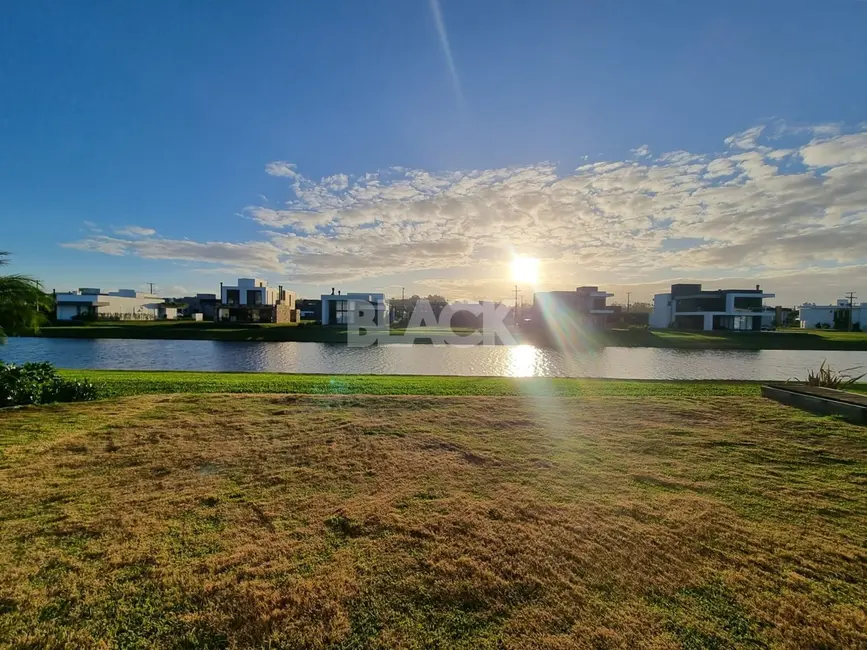 Foto 7 de Casa de Condomínio com 4 quartos à venda, 177m2 em Torres - RS