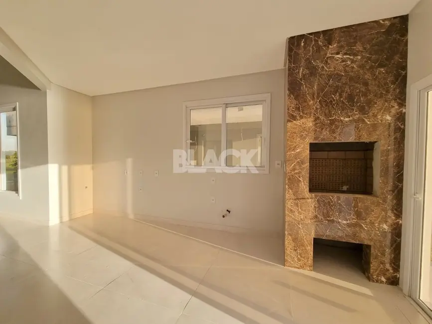 Foto 4 de Casa de Condomínio com 4 quartos à venda, 177m2 em Torres - RS