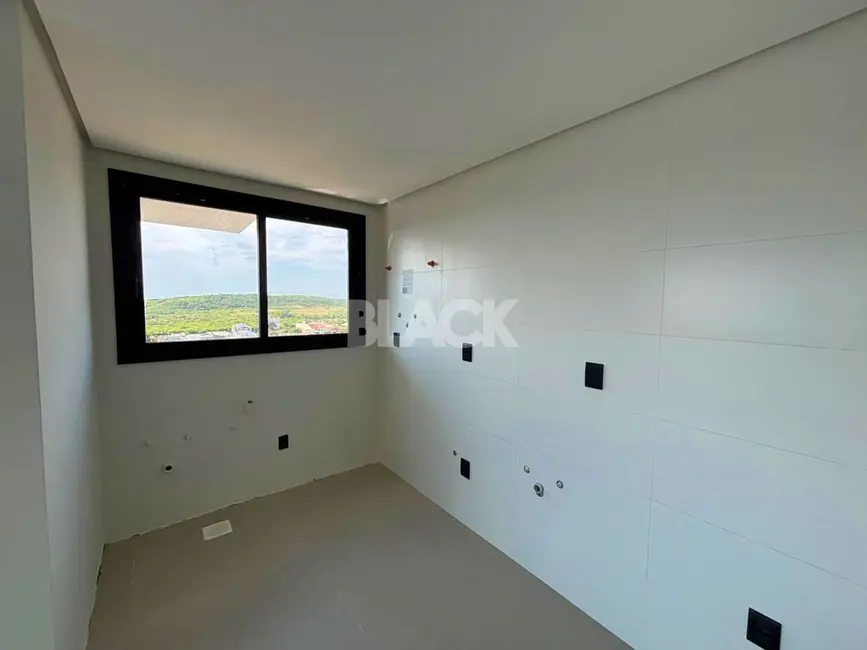 Foto 8 de Apartamento com 2 quartos à venda, 64m2 em Torres - RS