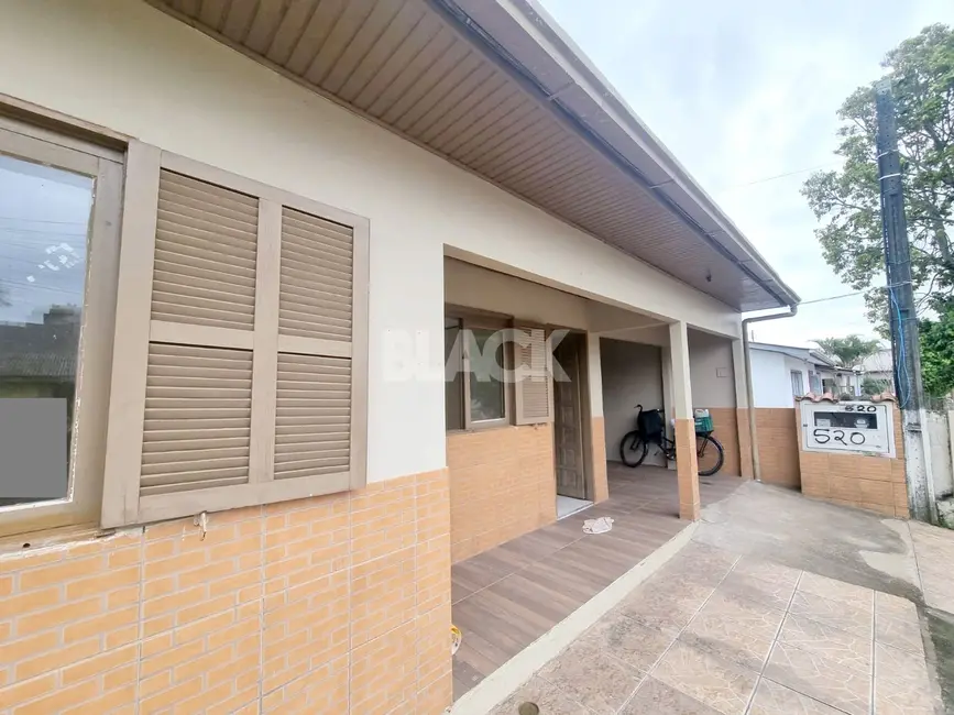 Foto 2 de Casa com 2 quartos à venda, 85m2 em Torres - RS
