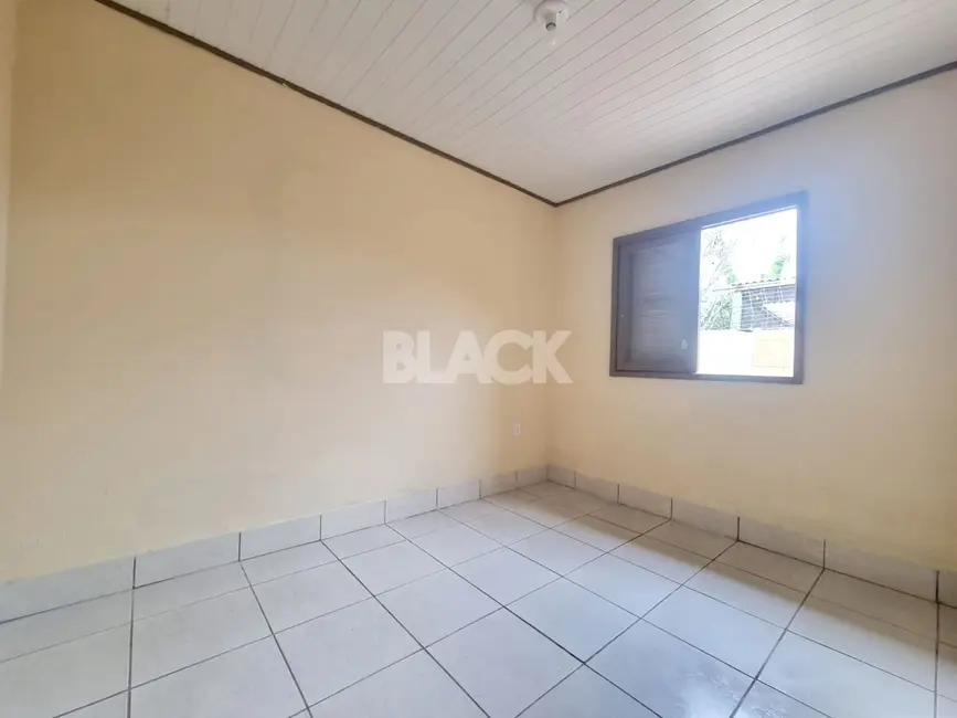 Foto 9 de Casa com 2 quartos à venda, 85m2 em Torres - RS
