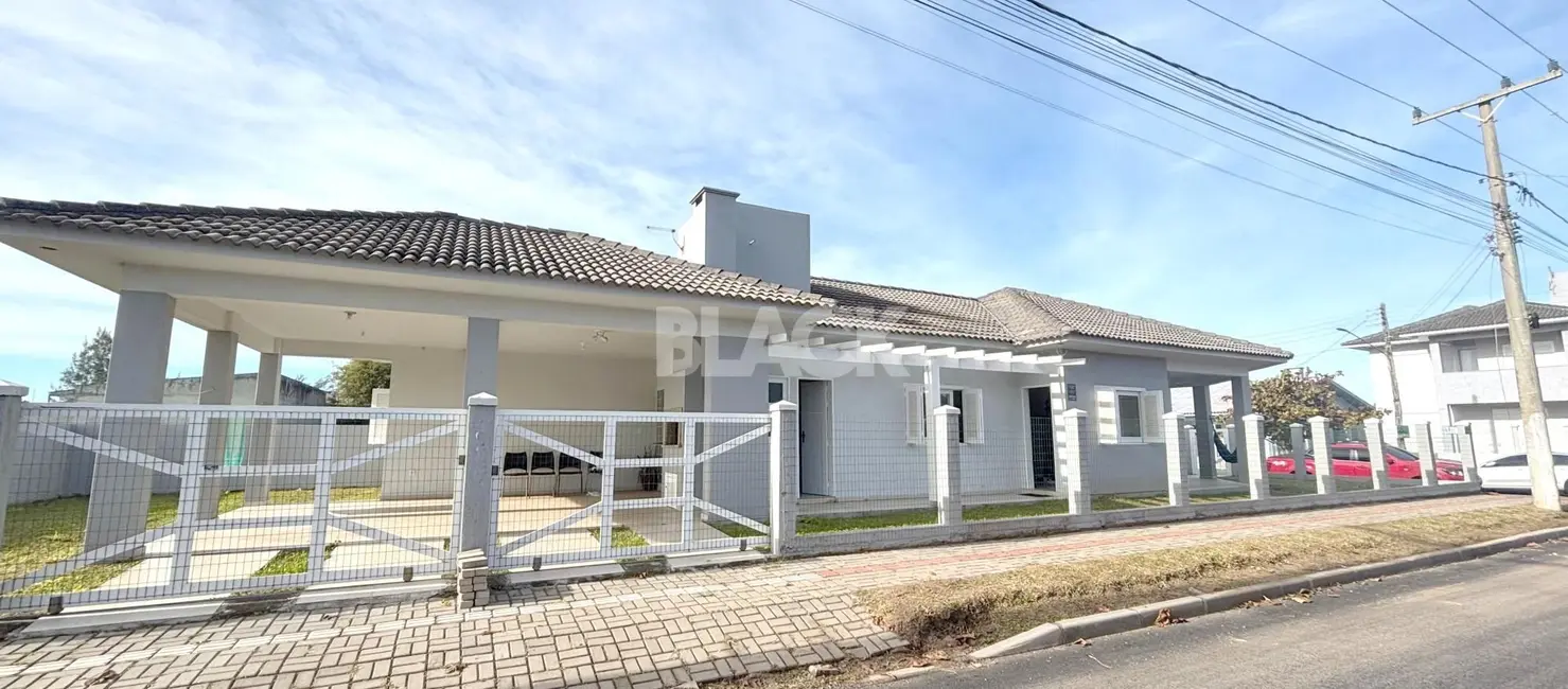 Casa com 3 quartos à venda, 180m2 em Torres - RS - imagem 1 Foto 1 de Casa com 3 quartos à venda, 180m2 em Torres - RS