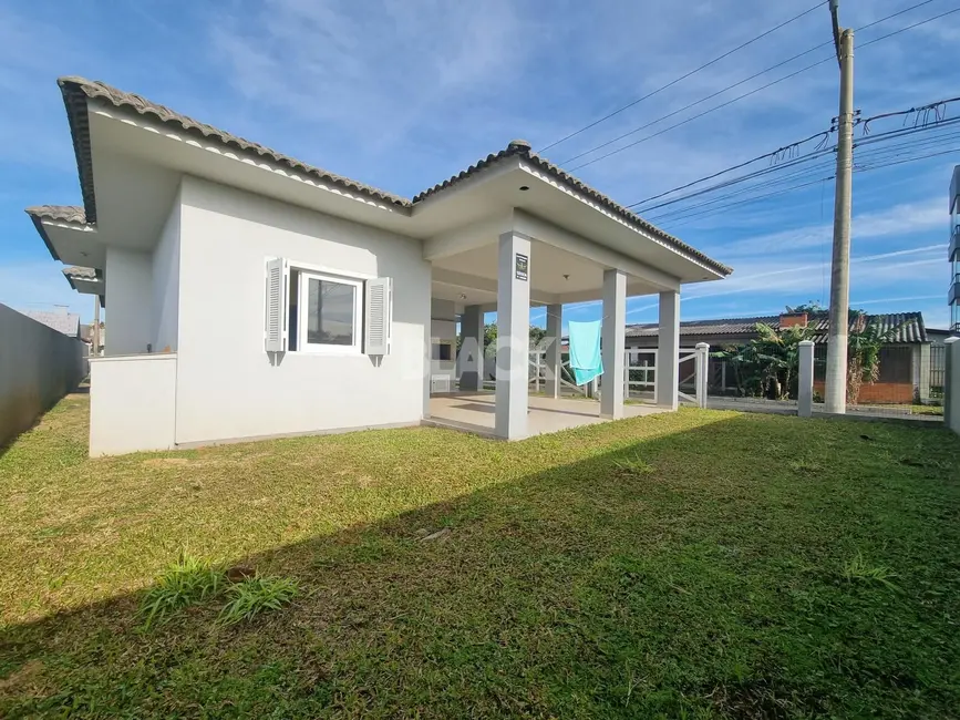 Casa com 3 quartos à venda, 180m2 em Torres - RS - imagem 4 Foto 4 de Casa com 3 quartos à venda, 180m2 em Torres - RS