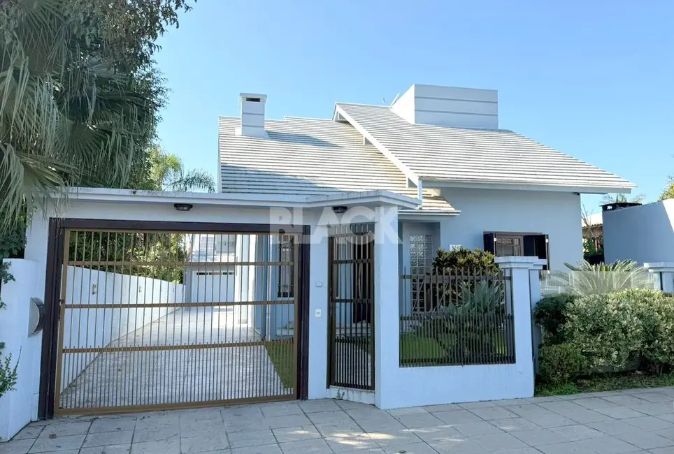 Foto 1 de Casa com 3 quartos à venda, 169m2 em Torres - RS