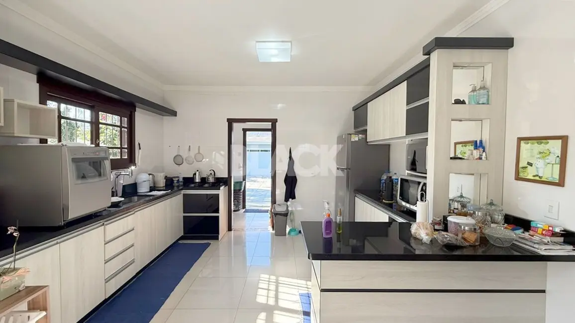 Foto 6 de Casa com 3 quartos à venda, 169m2 em Torres - RS