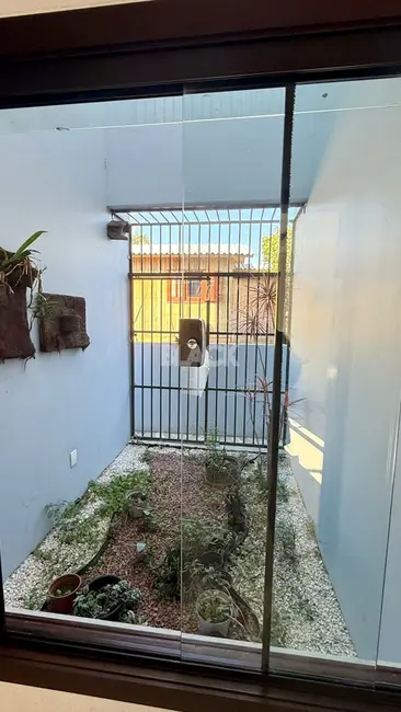 Foto 9 de Casa com 3 quartos à venda, 169m2 em Torres - RS