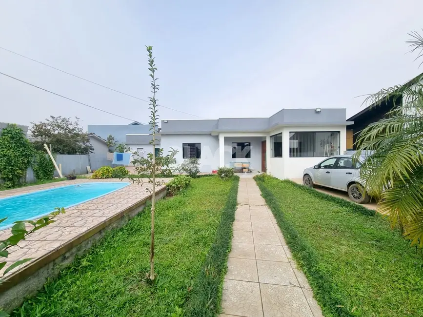 Casa com 3 quartos à venda, 150m2 em Torres - RS - imagem 1 Foto 1 de Casa com 3 quartos à venda, 150m2 em Torres - RS