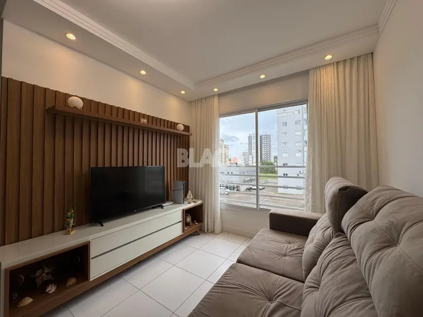 Apartamento com 2 quartos à venda, 50m2 em Torres - RS - imagem 2 Foto 2 de Apartamento com 2 quartos à venda, 50m2 em Torres - RS
