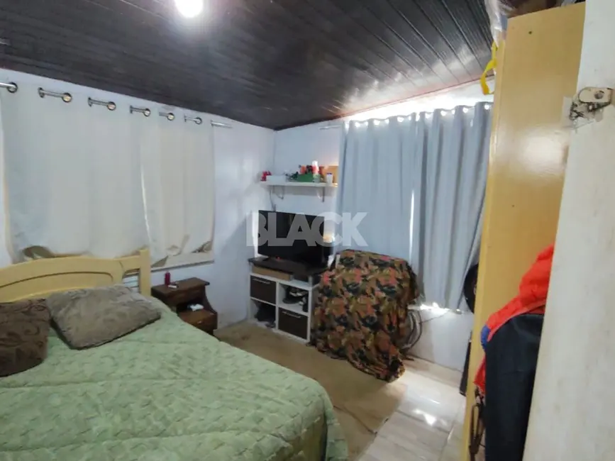 Foto 9 de Casa com 3 quartos à venda, 90m2 em Torres - RS