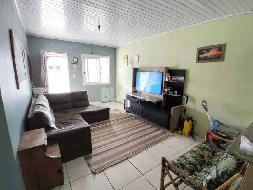 Foto 2 de Casa com 3 quartos à venda, 90m2 em Torres - RS