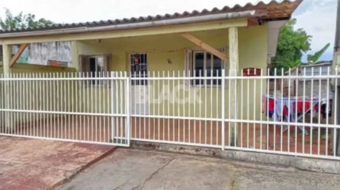 Foto 1 de Casa com 3 quartos à venda, 90m2 em Torres - RS