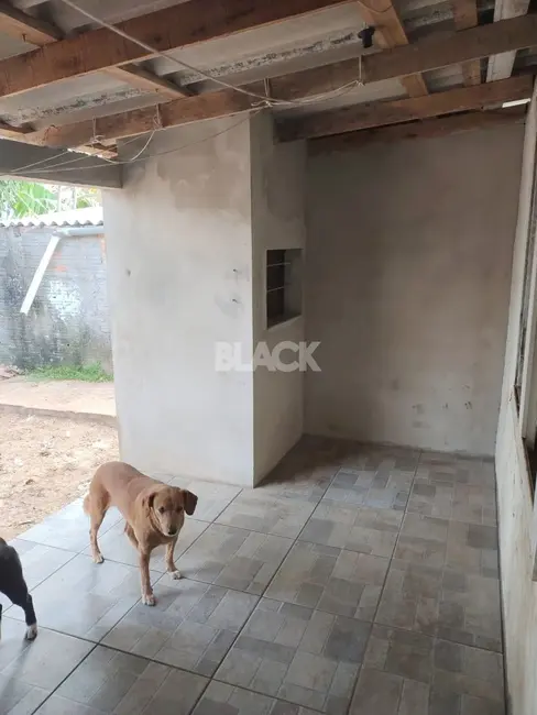 Foto 6 de Casa com 3 quartos à venda, 90m2 em Torres - RS