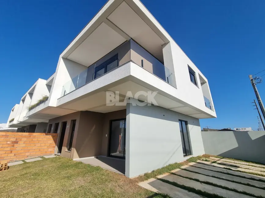 Casa com 3 quartos à venda, 120m2 em Torres - RS - imagem 2 Foto 2 de Casa com 3 quartos à venda, 120m2 em Torres - RS