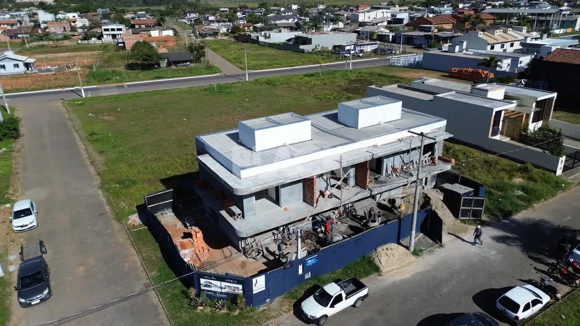Foto 1 de Casa com 2 quartos à venda, 123m2 em Torres - RS