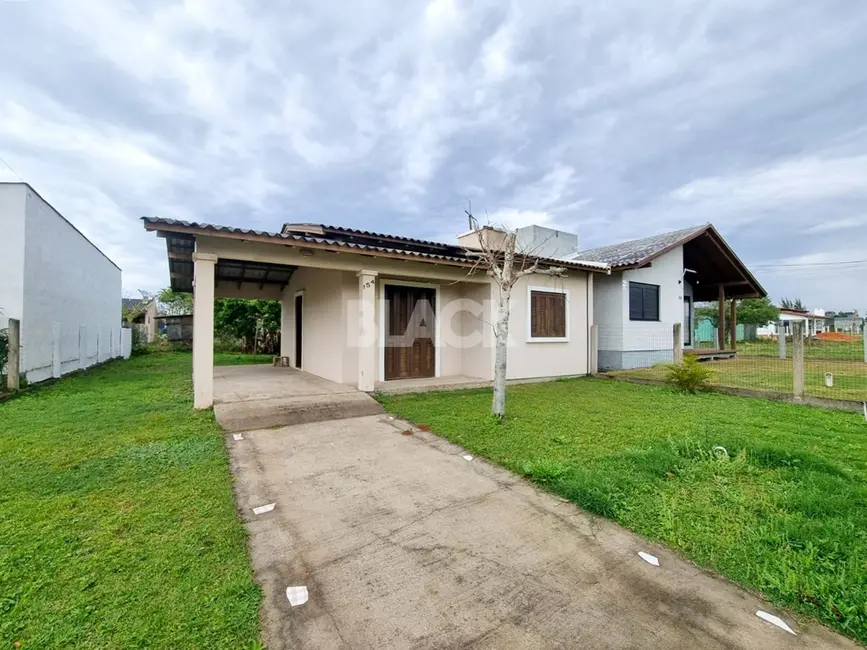 Foto 1 de Casa com 2 quartos à venda, 66m2 em Torres - RS
