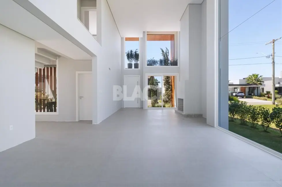 Casa de Condomínio com 4 quartos à venda, 260m2 em Torres - RS - imagem 4 Foto 4 de Casa de Condomínio com 4 quartos à venda, 260m2 em Torres - RS