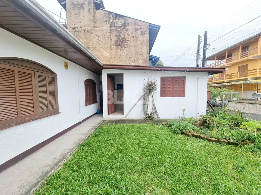 Foto 3 de Casa com 4 quartos à venda, 83m2 em Torres - RS