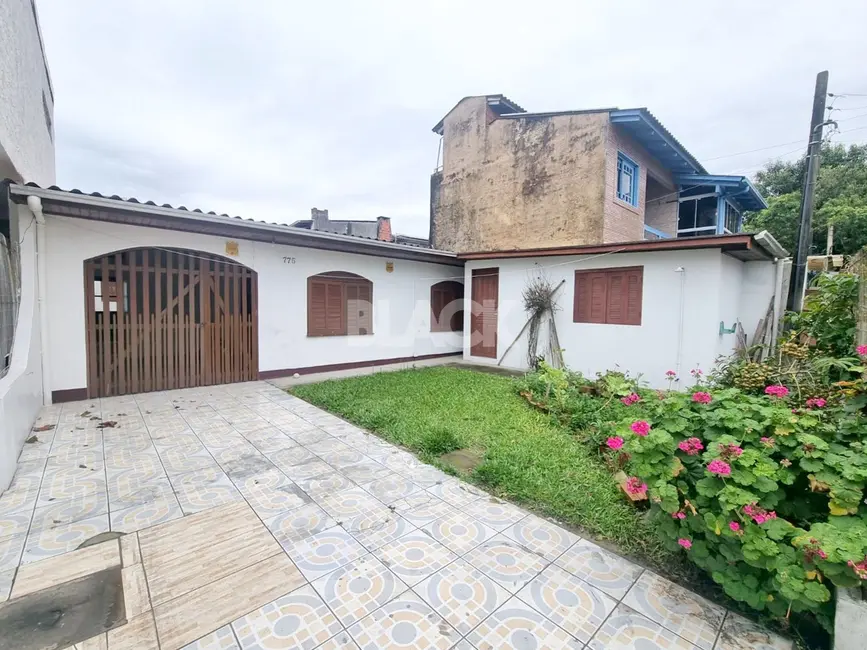 Foto 2 de Casa com 4 quartos à venda, 83m2 em Torres - RS