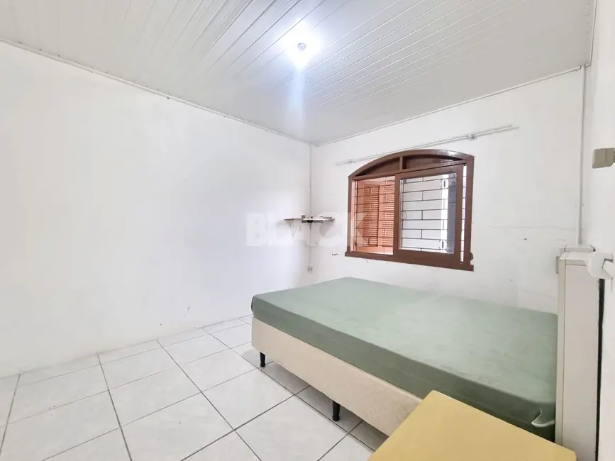 Foto 9 de Casa com 4 quartos à venda, 83m2 em Torres - RS