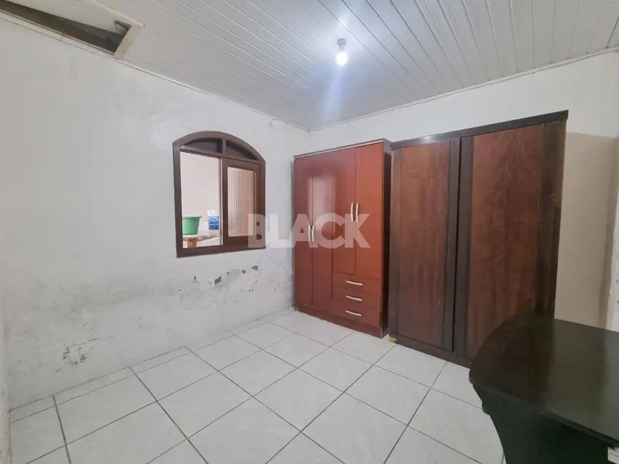 Foto 7 de Casa com 4 quartos à venda, 83m2 em Torres - RS
