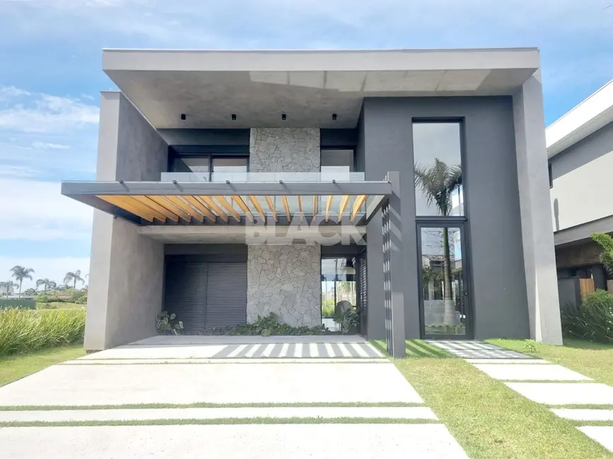Casa de Condomínio com 5 quartos à venda, 395m2 em Torres - RS - imagem 1 Foto 1 de Casa de Condomínio com 5 quartos à venda, 395m2 em Torres - RS