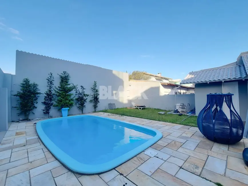 Casa com 3 quartos à venda, 159m2 em Torres - RS - imagem 2 Foto 2 de Casa com 3 quartos à venda, 159m2 em Torres - RS