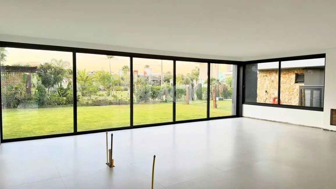 Foto 9 de Casa de Condomínio com 4 quartos à venda, 324m2 em Torres - RS
