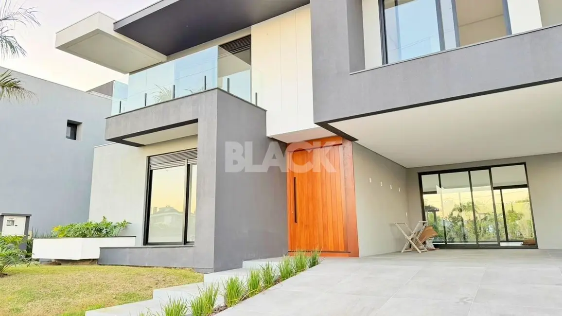 Foto 2 de Casa de Condomínio com 4 quartos à venda, 324m2 em Torres - RS
