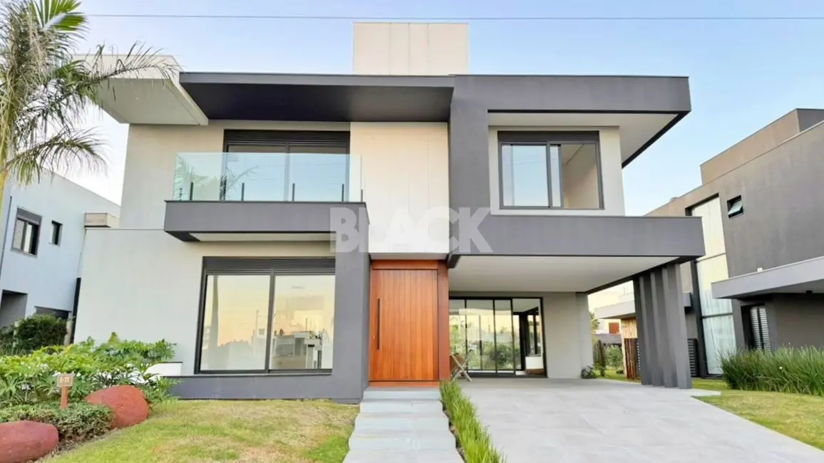 Foto 1 de Casa de Condomínio com 4 quartos à venda, 324m2 em Torres - RS