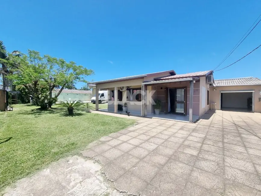 Casa com 3 quartos à venda, 250m2 em Torres - RS - imagem 1 Foto 1 de Casa com 3 quartos à venda, 250m2 em Torres - RS