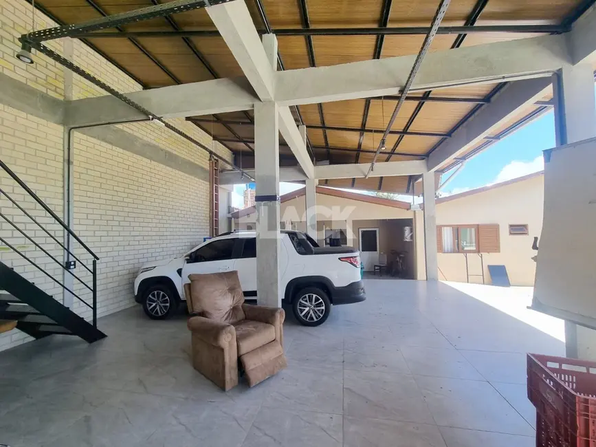 Casa com 3 quartos à venda, 250m2 em Torres - RS - imagem 5 Foto 5 de Casa com 3 quartos à venda, 250m2 em Torres - RS