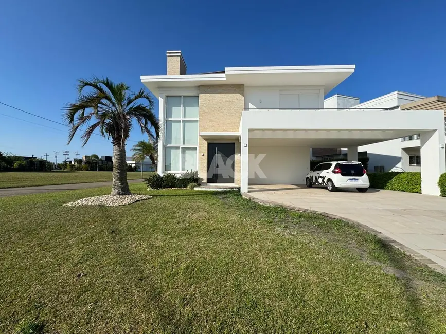 Foto 2 de Casa de Condomínio com 4 quartos à venda, 330m2 em Torres - RS