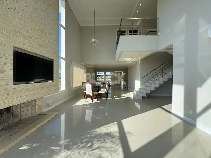 Foto 3 de Casa de Condomínio com 4 quartos à venda, 330m2 em Torres - RS