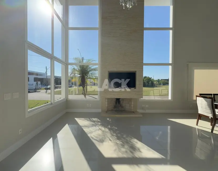 Foto 5 de Casa de Condomínio com 4 quartos à venda, 330m2 em Torres - RS