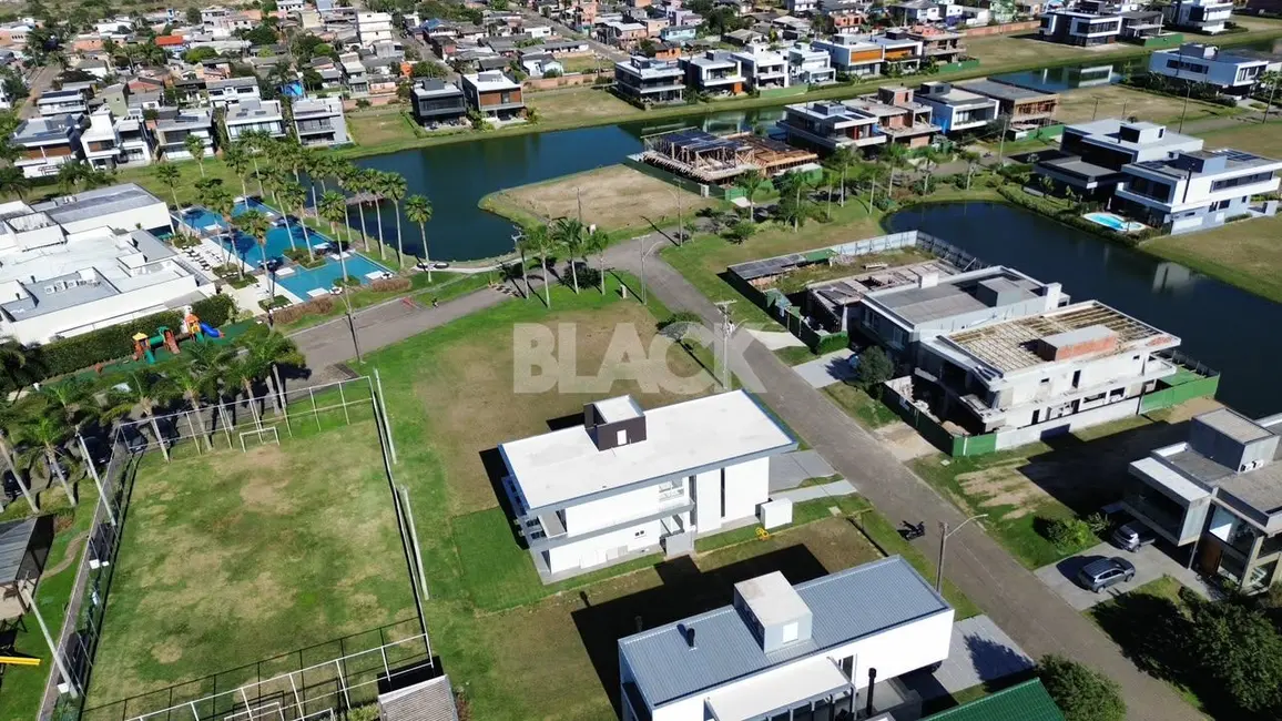 Foto 3 de Casa de Condomínio com 6 quartos à venda, 474m2 em Torres - RS