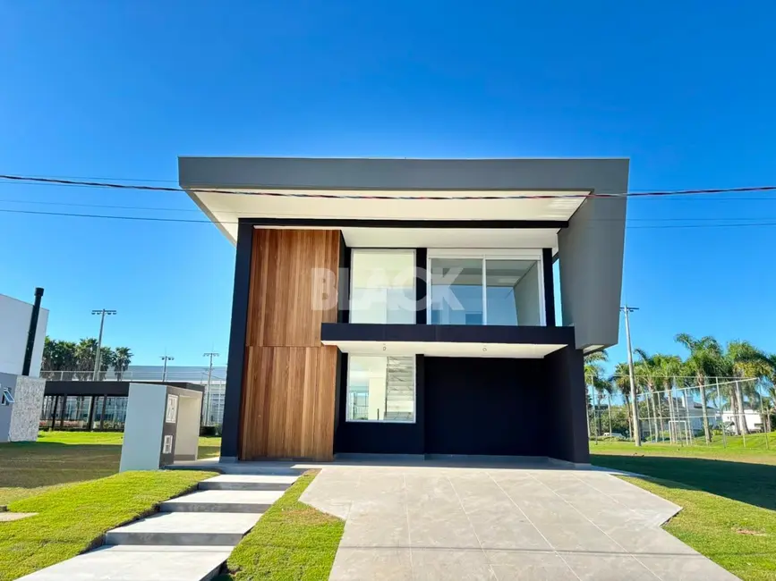 Foto 2 de Casa de Condomínio com 6 quartos à venda, 474m2 em Torres - RS